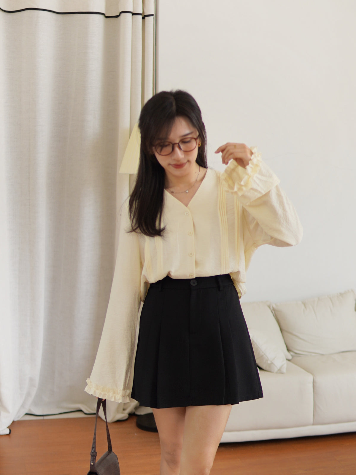 SARAH PLEATED MINI SKIRT