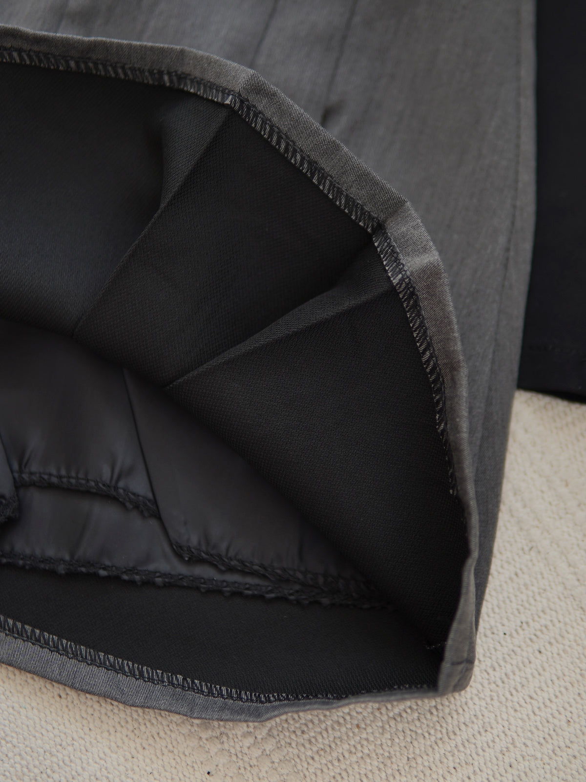 SARAH PLEATED MINI SKIRT