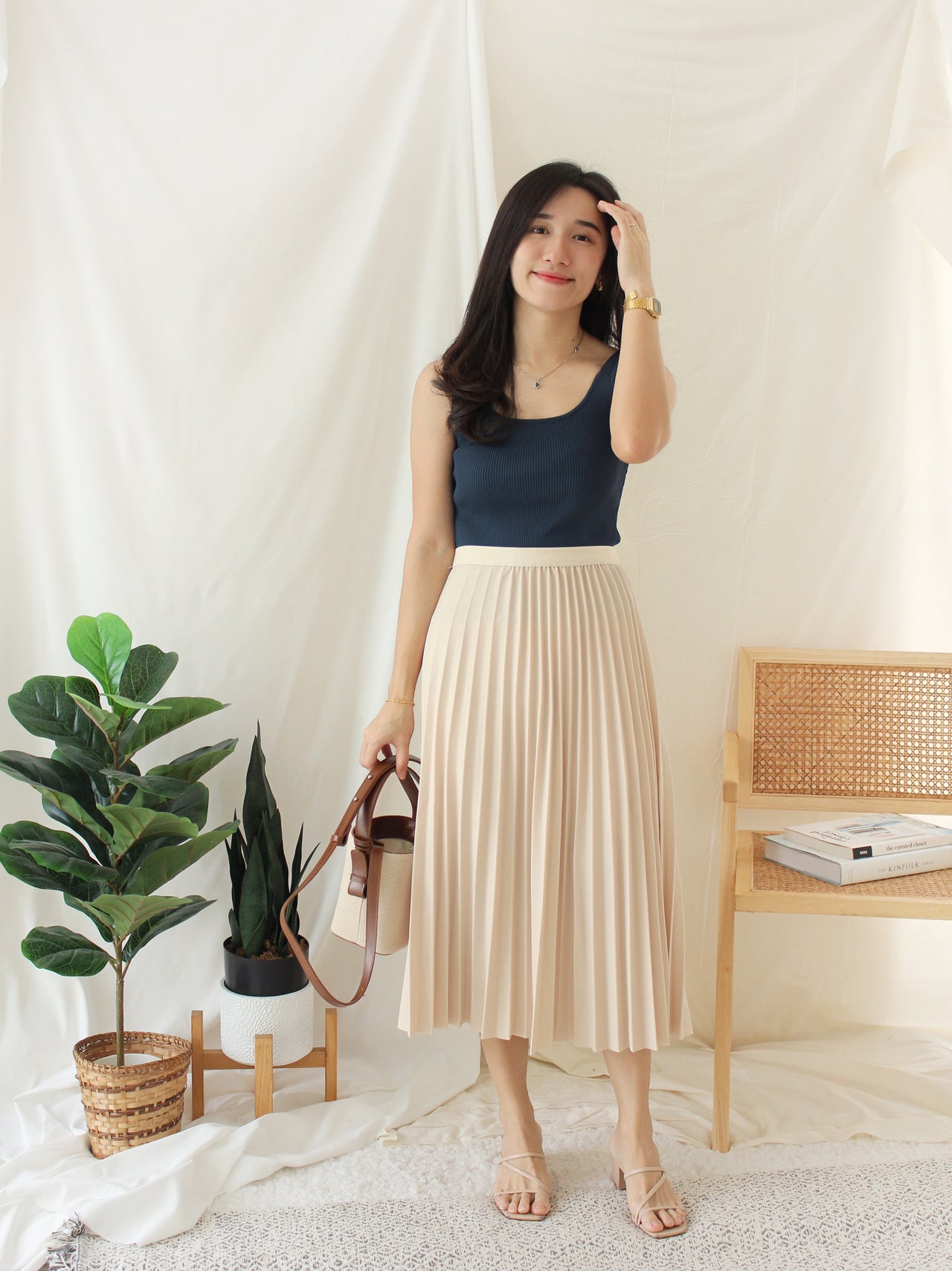 Rowen Pleat midi skirt